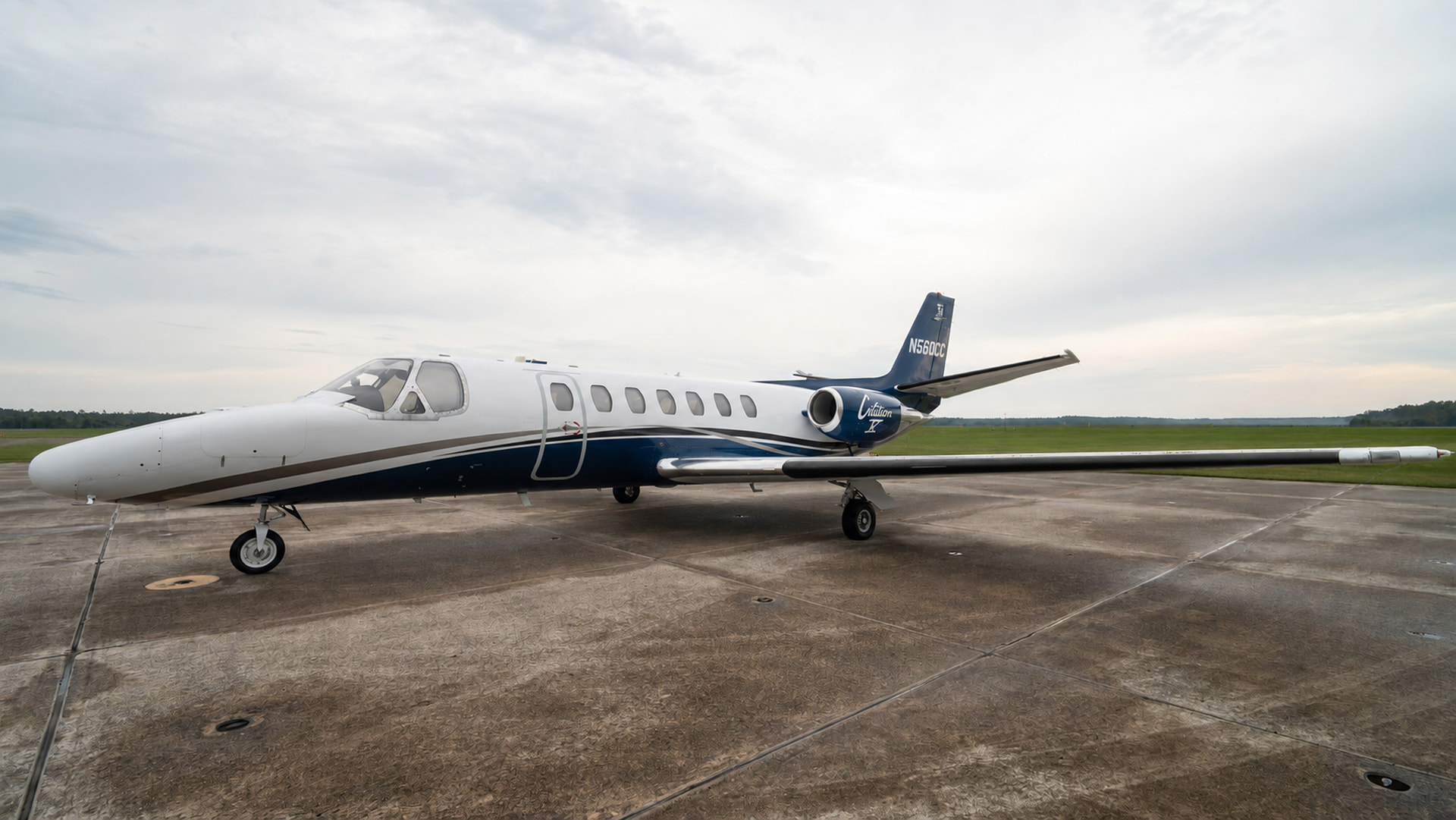 Full side profile of the Citation V on the tarmac