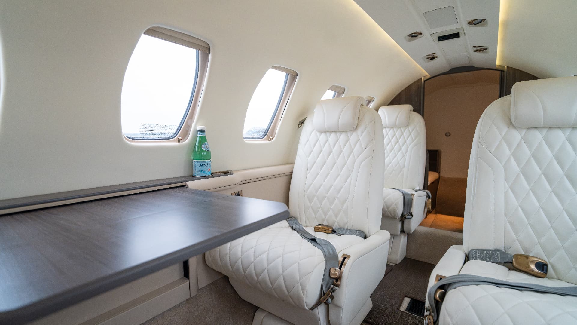 Citation V cabin seats with table and windows